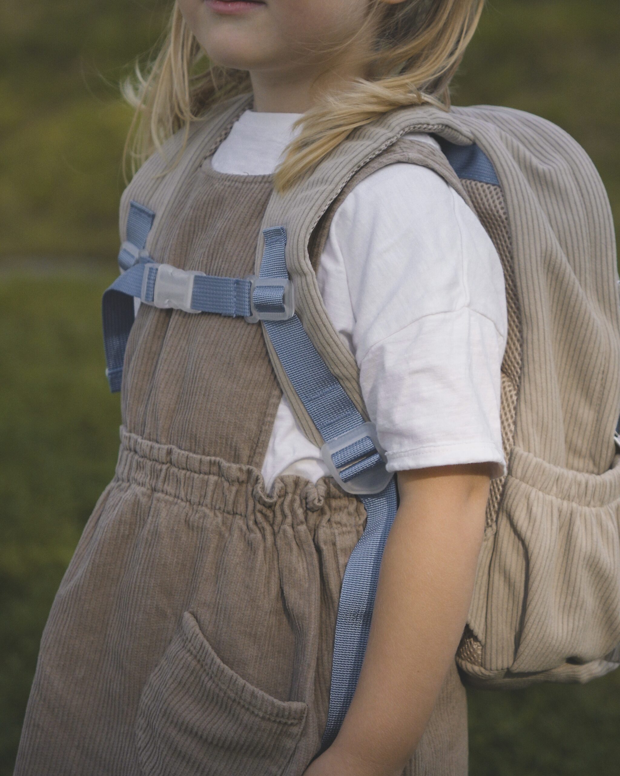 small beige corduroy backpack